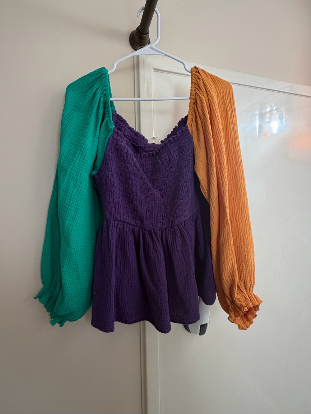BiBi Mardi Gras Long Sleeve Peplum Top